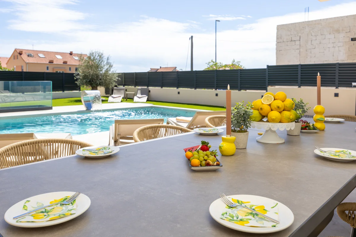 a table with plates and fruit on it