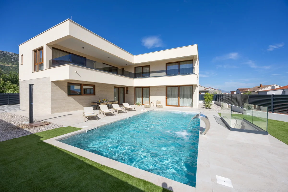 a large house with a swimming pool