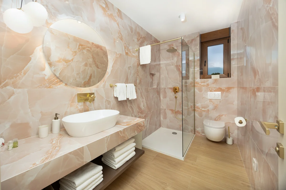 a bathroom with a glass shower