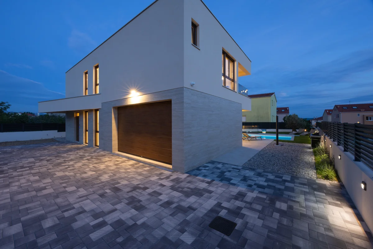 a building with a brick walkway